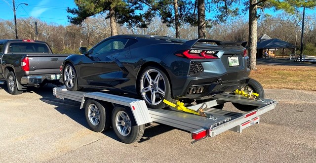 Chevrolet Corvette C8 on open trailer